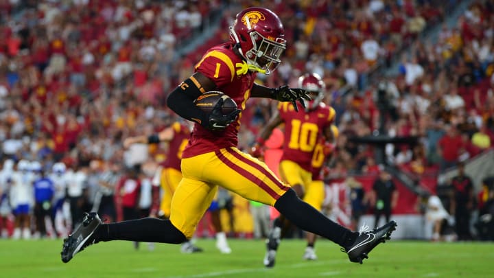 Aug 26, 2023; Los Angeles, California, USA; Southern California Trojans wide receiver Zachariah Branch (1) runs the ball in for a touchdown against the San Jose State Spartans during the second half at Los Angeles Memorial Coliseum. Mandatory Credit: Gary A. Vasquez-USA TODAY Sports