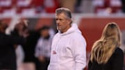 Utah Utes head coach Kyle Whittingham watch the team warm up before the game against the Iowa State Cyclones at Rice-Eccles Stadium.