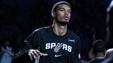 Oct 27, 2025; San Antonio, Texas, USA;  San Antonio Spurs forward/center Victor Wembanyama (1) is introduced before the game against the Toronto Raptors at Frost Bank Center. Mandatory Credit: Daniel Dunn-Imagn Images