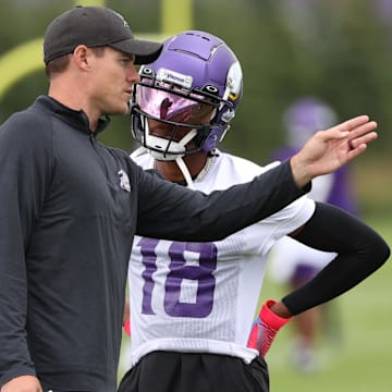 Jul 28, 2022; Minneapolis, MN, USA; Vikings head coach Kevin O'Connell and wide receiver Justin Jefferson (18) talk during training camp at TCO Performance Center.