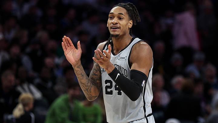 Nov 30, 2025; Minneapolis, Minnesota, USA; San Antonio Spurs guard Devin Vassell (24) reacts during the first half against the Minnesota Timberwolves at Target Center. Mandatory Credit: Matt Krohn-Imagn Images