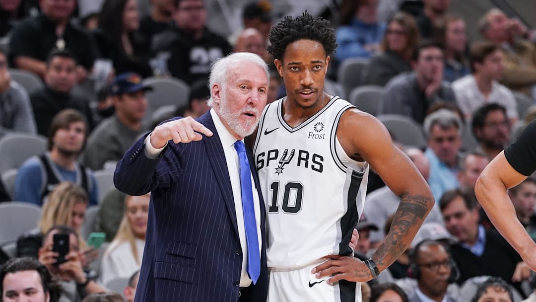 Dec 19, 2019; San Antonio, TX, USA; San Antonio Spurs head coach Gregg Popovich talks with guard DeMar DeRozan (10) during the second half against the Brooklyn Nets at the AT&T Center. 