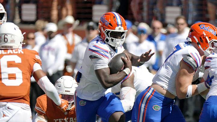 Oct 17, 2026; Austin, Texas, USA;  Florida Gators running back Jadan Baugh (13) runs for yards during the first half against the Texas Longhorns at Darrell K Royal-Texas Memorial Stadium.  Mandatory Credit: Scott Wachter-Imagn Images