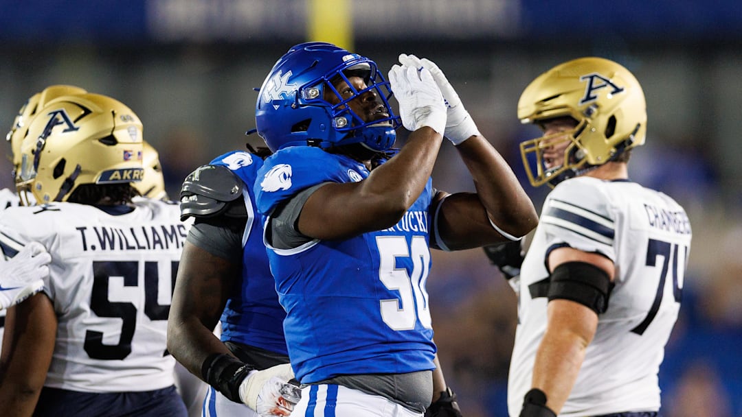Sep 16, 2023; Lexington, Kentucky, USA; Kentucky Wildcats defensive lineman Darrion Henry-Young (50) reacts during the second quarter against the Akron Zips at Kroger Field. Mandatory Credit: Jordan Prather-Imagn Images