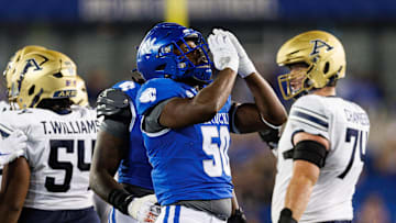 Sep 16, 2023; Lexington, Kentucky, USA; Kentucky Wildcats defensive lineman Darrion Henry-Young (50) reacts during the second quarter against the Akron Zips at Kroger Field. Mandatory Credit: Jordan Prather-Imagn Images