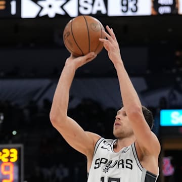 Jan 30, 2023; San Antonio, Texas, USA;  San Antonio Spurs forward Doug McDermott (17) shoots in the second half against the Washington Wizards at the AT&T Center. Mandatory Credit: Daniel Dunn-Imagn Images