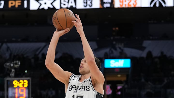 Jan 30, 2023; San Antonio, Texas, USA;  San Antonio Spurs forward Doug McDermott (17) shoots in the second half against the Washington Wizards at the AT&T Center. Mandatory Credit: Daniel Dunn-Imagn Images