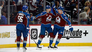 Mar 8, 2025; Denver, Colorado, USA; Colorado Avalanche right wing Valeri Nichushkin (13) celebrates his goal with center Brock Nelson (11) and defenseman Ryan Lindgren (55) in the first period against the Toronto Maple Leafs at Ball Arena. Mandatory Credit: Isaiah J. Downing-Imagn Images