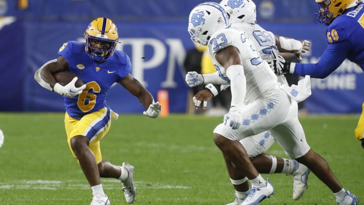 Sep 23, 2023; Pittsburgh, Pennsylvania, USA; Pittsburgh Panthers running back Rodney Hammond Jr. (6) runs the ball against the North Carolina Tar Heels during the first quarter at Acrisure Stadium. Mandatory Credit: Charles LeClaire-USA TODAY Sports