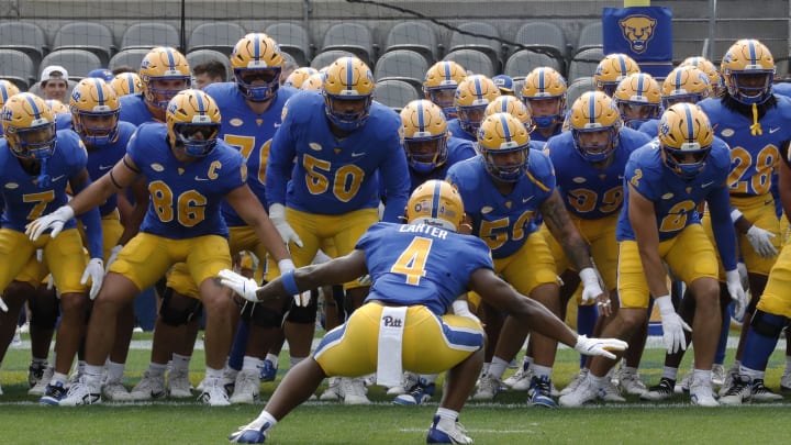 Aug 31, 2024; Pittsburgh, Pennsylvania, USA;  Pittsburgh Panthers running back Daniel Carter (4) gets the Panthers hyped up before a game against the Kent State Golden Flashes at Acrisure Stadium. Mandatory Credit: Charles LeClaire-USA TODAY Sports