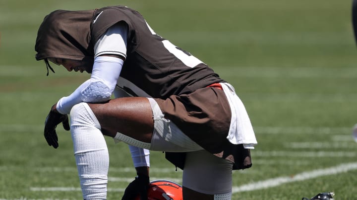 Browns cornerback Denzel Ward cools down on the sideline during minicamp, Tuesday, June 11, 2024, in Berea.