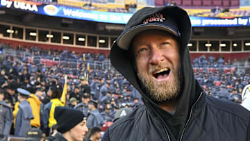 Dave Portnoy, Barstool Sports founder and owner, walks along the sidelines before the playing of the 125 Army-Navy game 