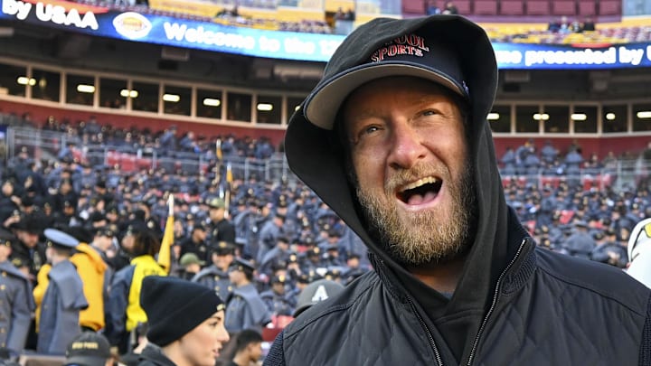 Dave Portnoy, Barstool Sports founder and owner, walks along the sidelines before the playing of the 125 Army-Navy game 