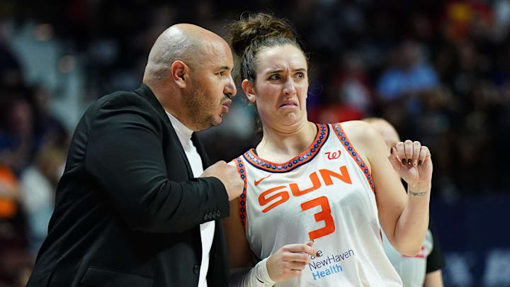 Sep 6, 2025; Uncasville, Connecticut, USA; Connecticut Sun head coach Rachid Meziane talks with guard Marina Mabrey (3) from the sideline as they take on the Phoenix Mercury at Mohegan Sun Arena.  David Butler II-Imagn Images