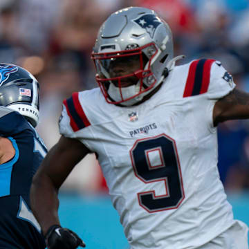Tennessee Titans safety Amani Hooker (37) intercepts a pass intended for New England Patriots wide receiver Kayshon Boutte (9) In overtime of their game at Nissan Stadium in Nashville, Tenn., Sunday, Nov. 3, 2024. The play ended the game with the Titans up 20-17 on the Patriots.