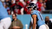Nov 16, 2025; Nashville, Tennessee, USA;  Tennessee Titans wide receiver Chimere Dike (17) looks down the line against the Houston Texans during the first half at Nissan Stadium. Mandatory Credit: Steve Roberts-Imagn Images