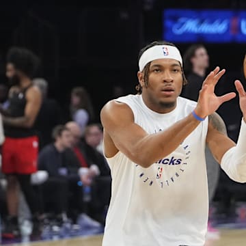 New York Knicks guard Miles McBride warms up prior to the game against the Chicago Bulls. Mandatory Credit: Gregory Fisher-Imagn Images