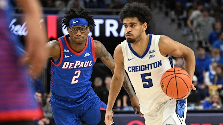 Creighton Bluejays guard Nik Graves (5) dribbles against DePaul Blue Demons guard Layden Blocker (2) during the second half at CHI Health Center Omaha. Creighton Bluejays guard Nik Graves (5) dribbles against DePaul Blue Demons guard Layden Blocker (2) during the second half at CHI Health Center Omaha.