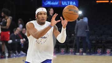New York, New York, USA; New York Knicks guard Pacome Dadiet (4) warms up prior to the game against the Chicago Bulls at Madison Square Garden. Mandatory Credit: Gregory Fisher-Imagn Images