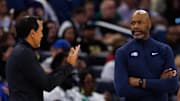 Oct 12, 2025; Orlando, Florida, USA; Miami Heat Head Coach Erik Spoelstra, Orlando Magic Head Coach Jamahl Mosley and NBA referee Robert Hussey react during a free throw during the first half at Kia Center. Mandatory Credit: Matt Pendleton-Imagn Images