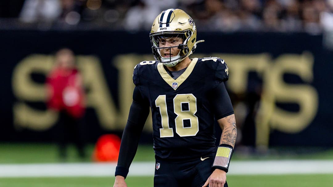 Dec 29, 2024; New Orleans, Louisiana, USA;  New Orleans Saints quarterback Spencer Rattler (18) looks on against the Las Vegas Raiders during the first half at Caesars Superdome. Mandatory Credit: Stephen Lew-Imagn Images