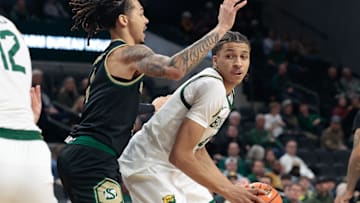 Dec 2, 2025; Waco, Texas, USA; Baylor Bears guard Cameron Carr (43) looks to pass against Sacramento State Hornets guard Jahni Summers (4) during the first half at Paul and Alejandra Foster Pavilion. Mandatory Credit: Chris Jones-Imagn Images