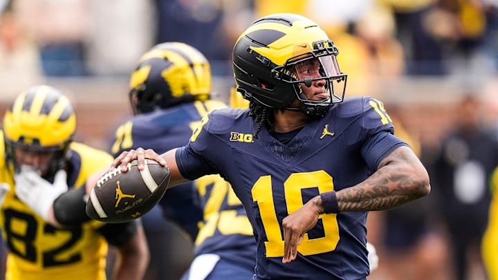Team Blue quarterback Bryce Underwood (19) makes a pass against Team Maize during the first half of the spring game at Michigan Stadium in Ann Arbor on Saturday, April 19, 2025.