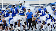 Memphis players and head coach Ryan Silverfield run onto the field before the game between Memphis and North Alabama at Simmons Bank Liberty Stadium in Memphis, Tenn., on Saturday, August 31, 2024.