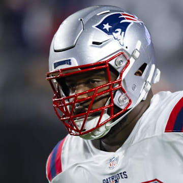 Dec 12, 2022; Glendale, Arizona, USA; New England Patriots defensive tackle Davon Godchaux (92) against the Arizona Cardinals at State Farm Stadium. Mandatory Credit: Mark J. Rebilas-Imagn Images