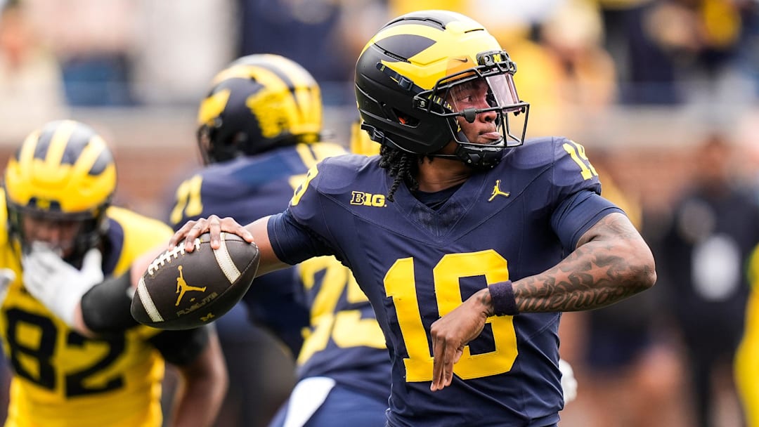 Team Blue quarterback Bryce Underwood (19) makes a pass against Team Maize during the first half of the spring game at Michigan Stadium in Ann Arbor on Saturday, April 19, 2025.