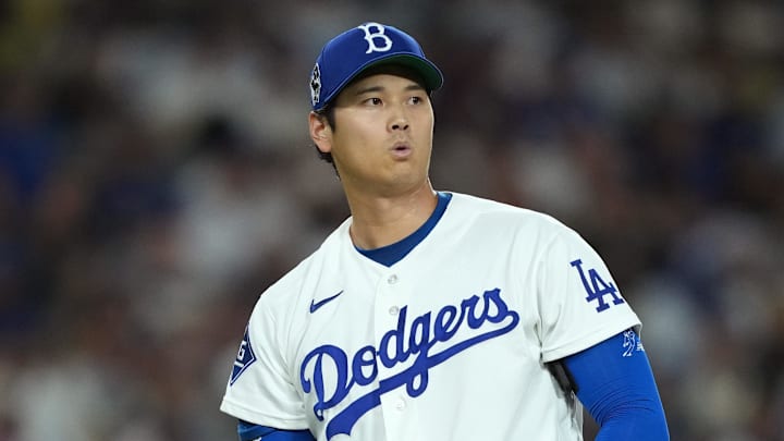 Los Angeles Dodgers two-way player Shohei Ohtani reacts 