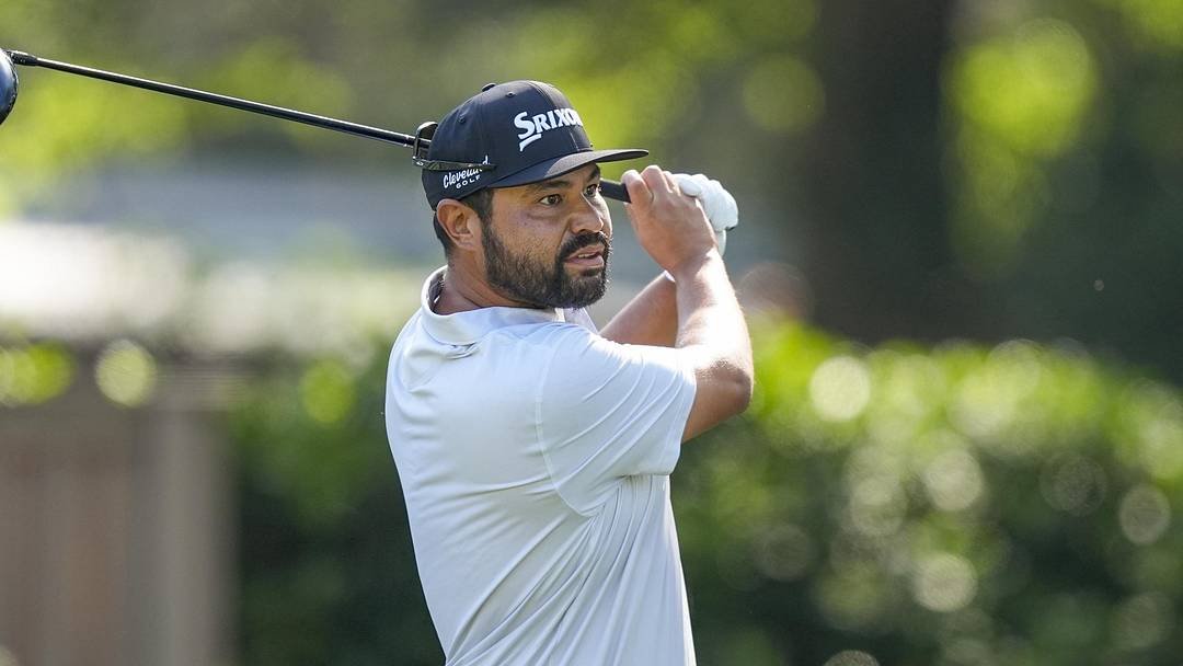 J.J. Spaun watches his shot travel on the third fairway during the first round of the 2026 RBC Heritage