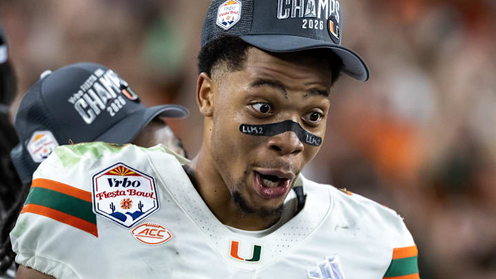 Jan 8, 2026; Glendale, AZ, USA; Miami Hurricanes wide receiver CJ Daniels (7) celebrates after defeating the Mississippi Rebels during the 2026 Fiesta Bowl and semifinal game of the College Football Playoff at State Farm Stadium. 