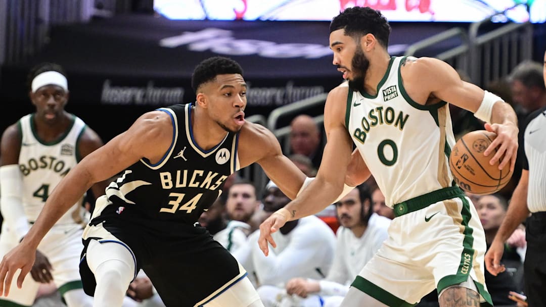 Jan 11, 2024; Milwaukee, Wisconsin, USA; Boston Celtics forward Jayson Tatum (0) drives for the basket against Milwaukee Bucks forward Giannis Antetokounmpo (34) in the second quarter at Fiserv Forum. Mandatory Credit: Benny Sieu-Imagn Images Jan 11, 2024; Milwaukee, Wisconsin, USA; Boston Celtics forward Jayson Tatum (0) drives for the basket against Milwaukee Bucks forward Giannis Antetokounmpo (34) in the second quarter at Fiserv Forum. Mandatory Credit: Benny Sieu-Imagn Images