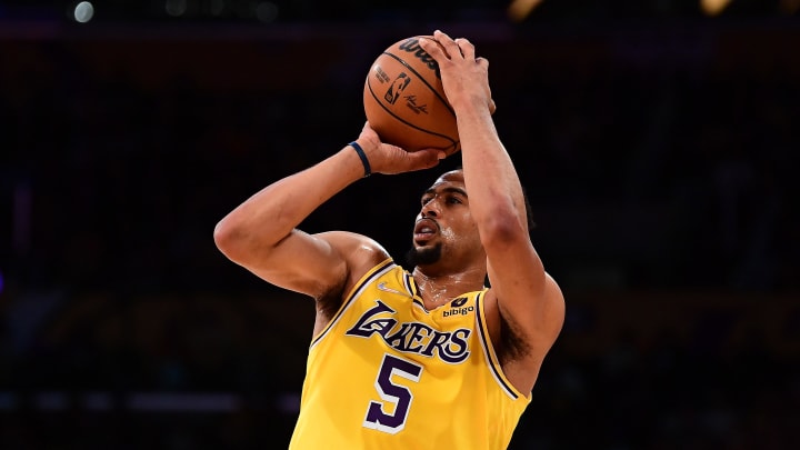 Mar 14, 2022; Los Angeles, California, USA; Los Angeles Lakers guard Talen Horton-Tucker (5) shoots against the Toronto Raptors during the second half at Crypto.com Arena. Mandatory Credit: Gary A. Vasquez-USA TODAY Sports