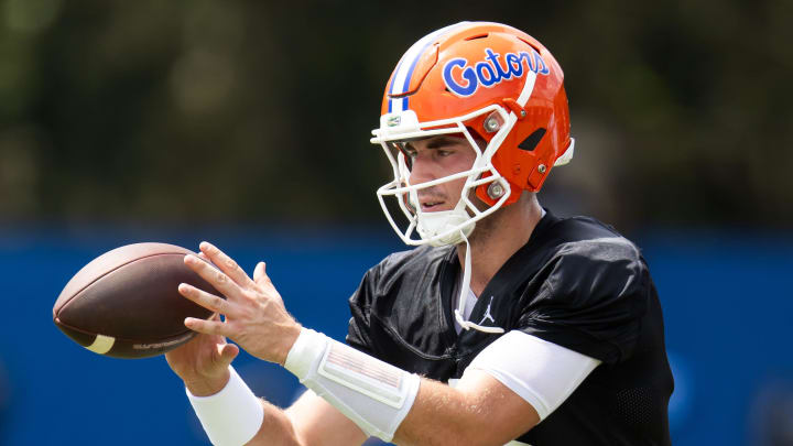 Florida Gators quarterback Graham Mertz (15) takes a snap during Fall practice at Sanders Practice Fields in Gainesville, FL on Thursday, August 1, 2024. [Doug Engle/Gainesville Sun]