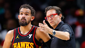 Trae Young #11 and Atlanta Hawks head coach Quin Snyder react against the Sacramento Kings.