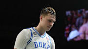 Apr 5, 2025; San Antonio, TX, USA; Duke Blue Devils forward Cooper Flagg (2) walks off the court after losing to the Houston Cougars in the semifinals of the men's Final Four of the 2025 NCAA Tournament at the Alamodome. Mandatory Credit: Robert Deutsch-Imagn Images