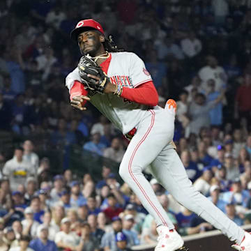 Aug 4, 2025; Chicago, Illinois, USA; Cincinnati Reds shortstop Elly De La Cruz (44) makes a play on Chicago Cubs outfielder Ian Happ (not pictured) during the seventh inning at Wrigley Field. Mandatory Credit: David Banks-Imagn Images