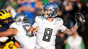 Oregon quarterback Dillon Gabriel makes a pass against Michigan during the first half at Michigan Stadium in Ann Arbor.