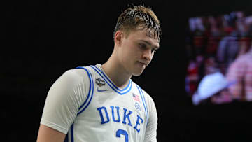 Apr 5, 2025; San Antonio, TX, USA; Duke Blue Devils forward Cooper Flagg (2) walks off the court after losing to the Houston Cougars in the semifinals of the men's Final Four of the 2025 NCAA Tournament at the Alamodome. Mandatory Credit: Robert Deutsch-Imagn Images
