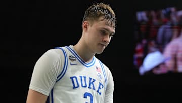 Apr 5, 2025; San Antonio, TX, USA; Duke Blue Devils forward Cooper Flagg (2) walks off the court after losing to the Houston Cougars in the semifinals of the men's Final Four of the 2025 NCAA Tournament at the Alamodome. Mandatory Credit: Robert Deutsch-Imagn Images