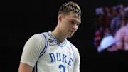 Apr 5, 2025; San Antonio, TX, USA; Duke Blue Devils forward Cooper Flagg (2) walks off the court after losing to the Houston Cougars in the semifinals of the men's Final Four of the 2025 NCAA Tournament at the Alamodome. Mandatory Credit: Robert Deutsch-Imagn Images