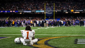 Texas Longhorns wide receiver Xavier Worthy (1) sits in the endzone after the 31-37 loss to the