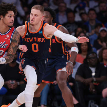 Apr 22, 2024; New York, New York, USA;  Philadelphia 76ers guard Kelly Oubre Jr. (9) dribbles against New York Knicks guard Donte DiVincenzo (0) during the second half during game two of the first round for the 2024 NBA playoffs at Madison Square Garden. Mandatory Credit: Vincent Carchietta-USA TODAY Sports