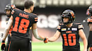 Jun 15, 2024; Vancouver, British Columbia, CAN;  BC Lions kicker Sean Whyte (10) celebrates the win  with teammate wide receiver Justin McInnis (18) at BC Place. Mandatory Credit: Simon Fearn-Imagn Images