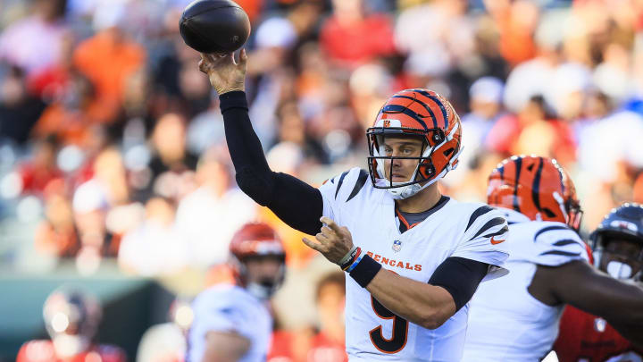 Aug 10, 2024; Cincinnati, Ohio, USA; Cincinnati Bengals quarterback Joe Burrow (9) throws a pass against the Tampa Bay Buccaneers in the first half at Paycor Stadium. Mandatory Credit: Katie Stratman-USA TODAY Sports