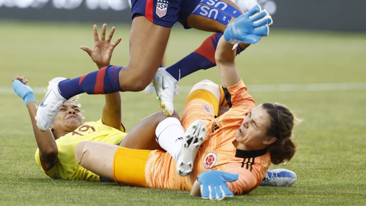 Columbia defender Jorelyn Carabali and goalkeeper Catalina Perez stop USA forward Margaret Purce in the first half during an international friendly soccer match at Rio Tinto Stadium. 