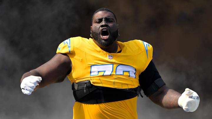 Oct 19, 2025; Inglewood, California, USA;  Los Angeles Chargers guard Mekhi Becton (73) runs on to the the field for the game against the Indianapolis Colts at SoFi Stadium. Mandatory Credit: Jayne Kamin-Oncea-Imagn Images