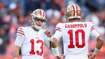San Francisco 49ers quarterbacks Brock Purdy (L) and Jimmy Garoppolo (R)